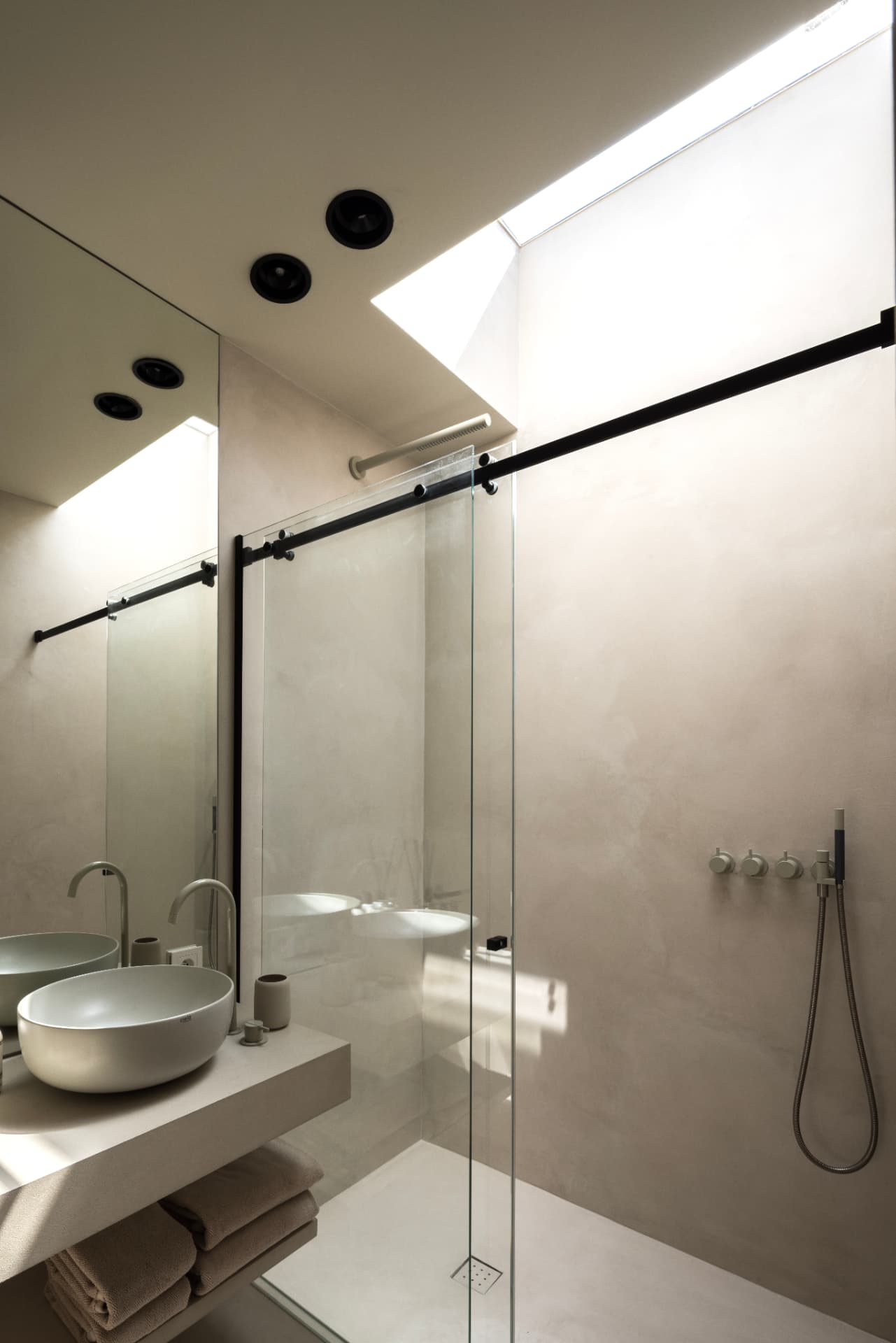 Bright ensuite shower with skylight at OXfield