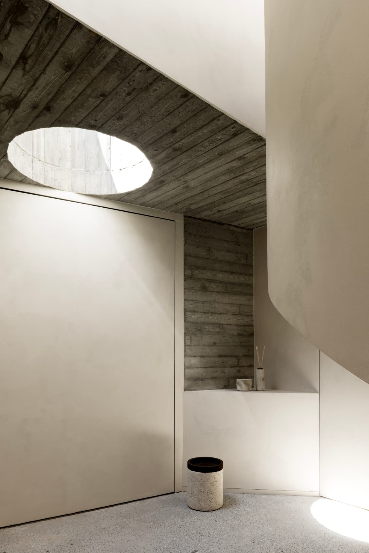 Sculptural staircase and skylight at OXfield